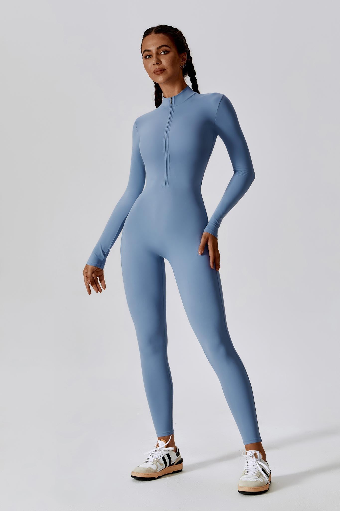 Maison and Aurora Loren jumpsuit in chambray fabric, featuring a relaxed fit and adjustable straps, displayed on a model.