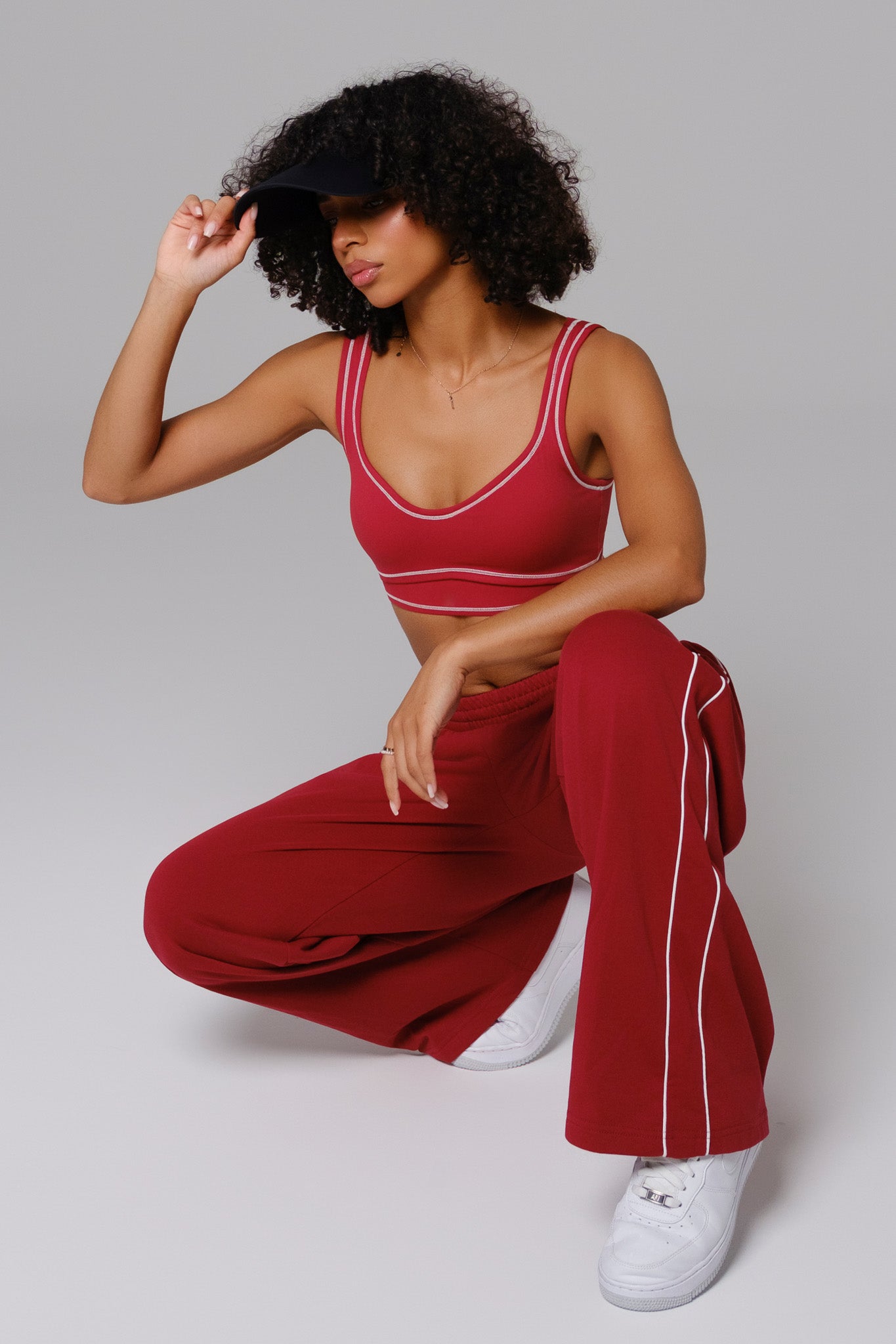 Maison and Aurora Shelly Sweatpants in cherry red, featuring a relaxed fit and soft fabric for comfortable casual wear.
