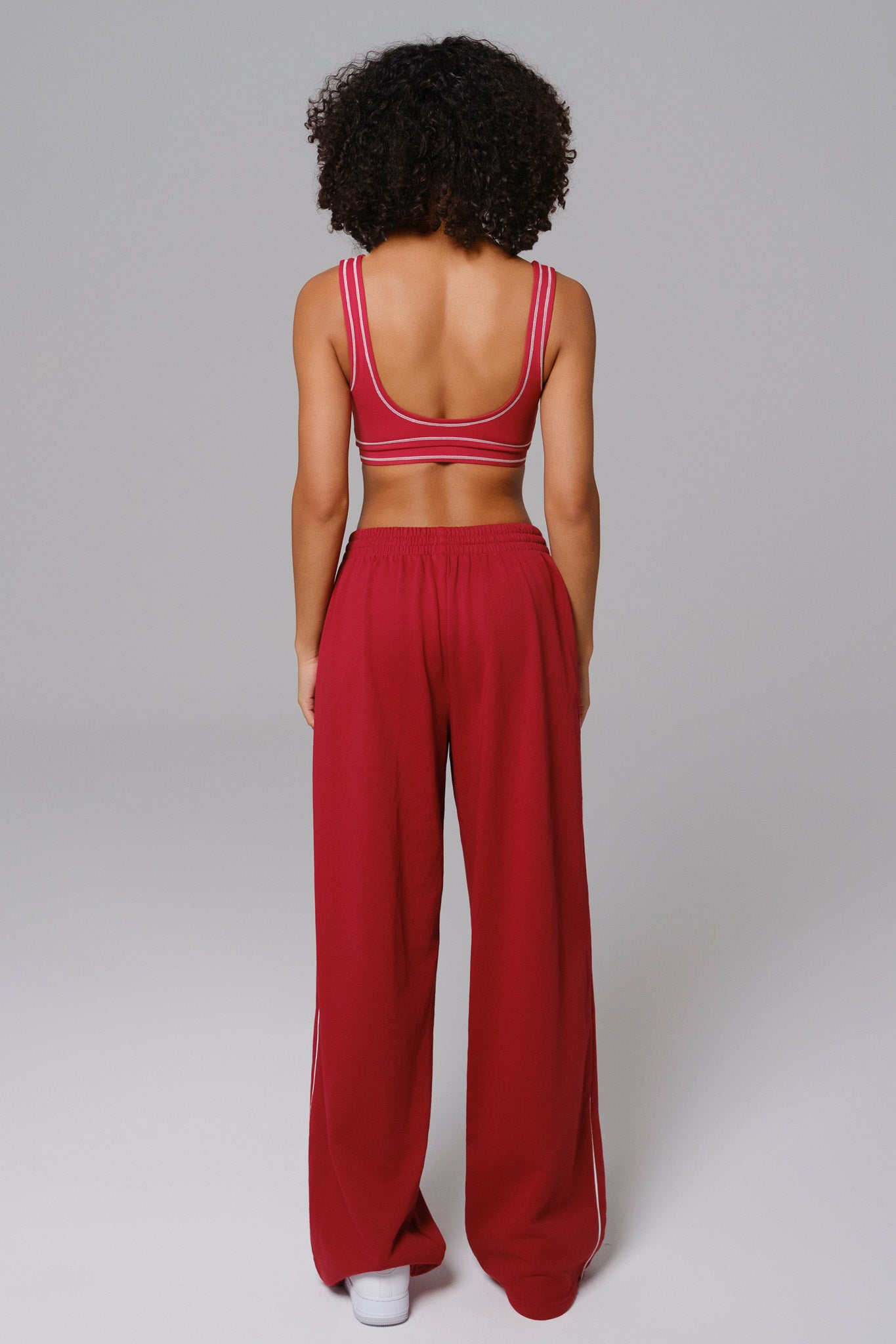 Maison and Aurora Shelly Sweatpants in vibrant cherry red, casual fit with elastic waistband and soft fabric.
