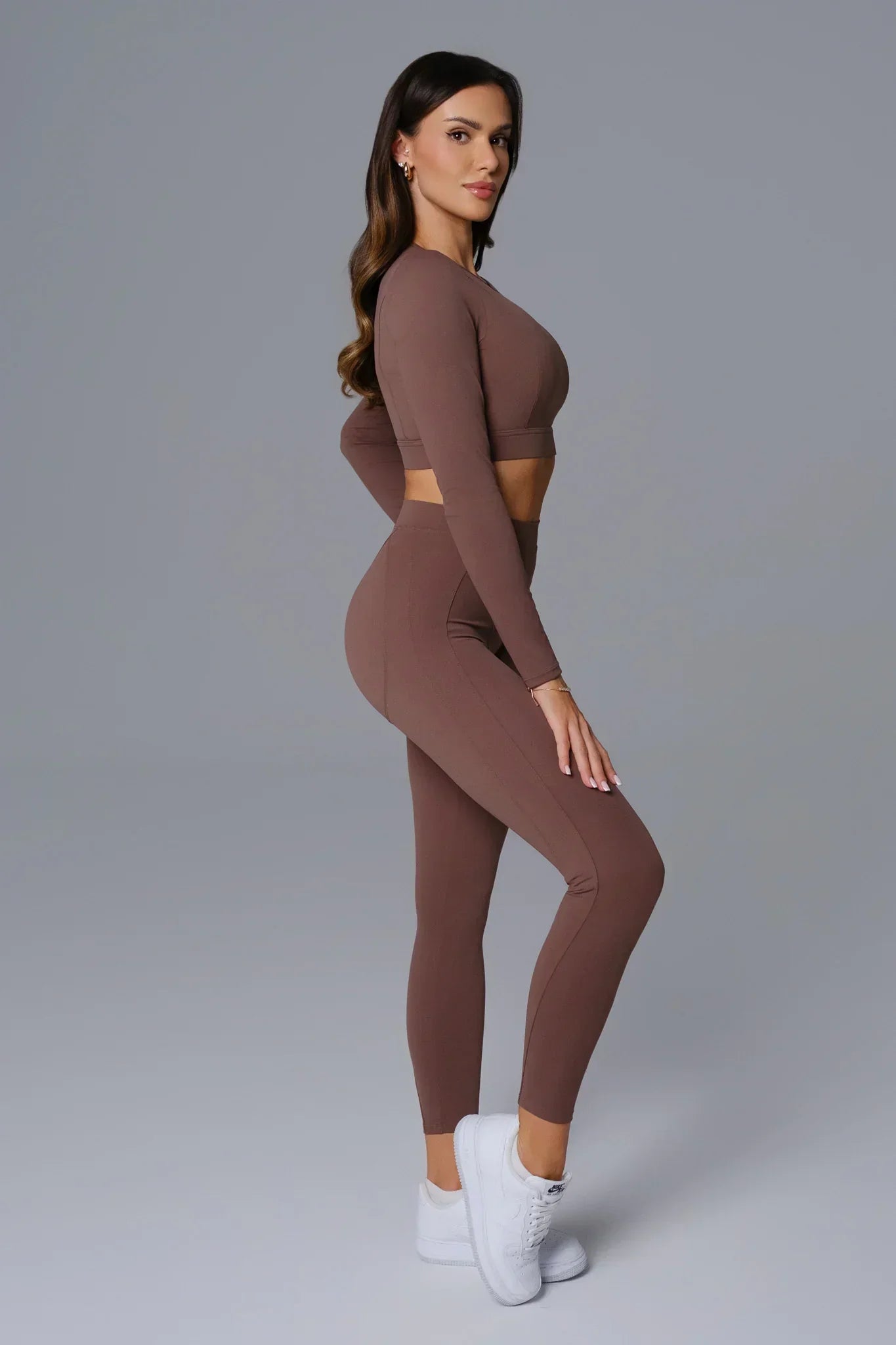 Maison and Aurora Essential High Waist Sculpting Leggings in Umber, showcasing fitted design and high-rise style.