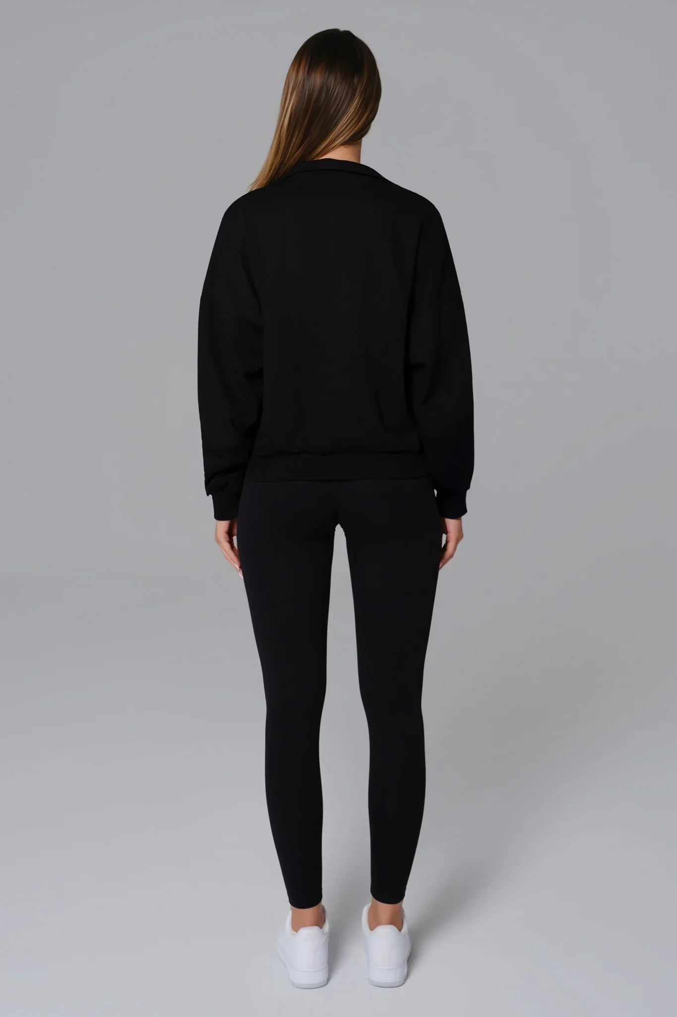 Black Maison and Aurora Essential Half Zip Sweatshirt, a stylish casual top with a half-zip front and comfortable fit.