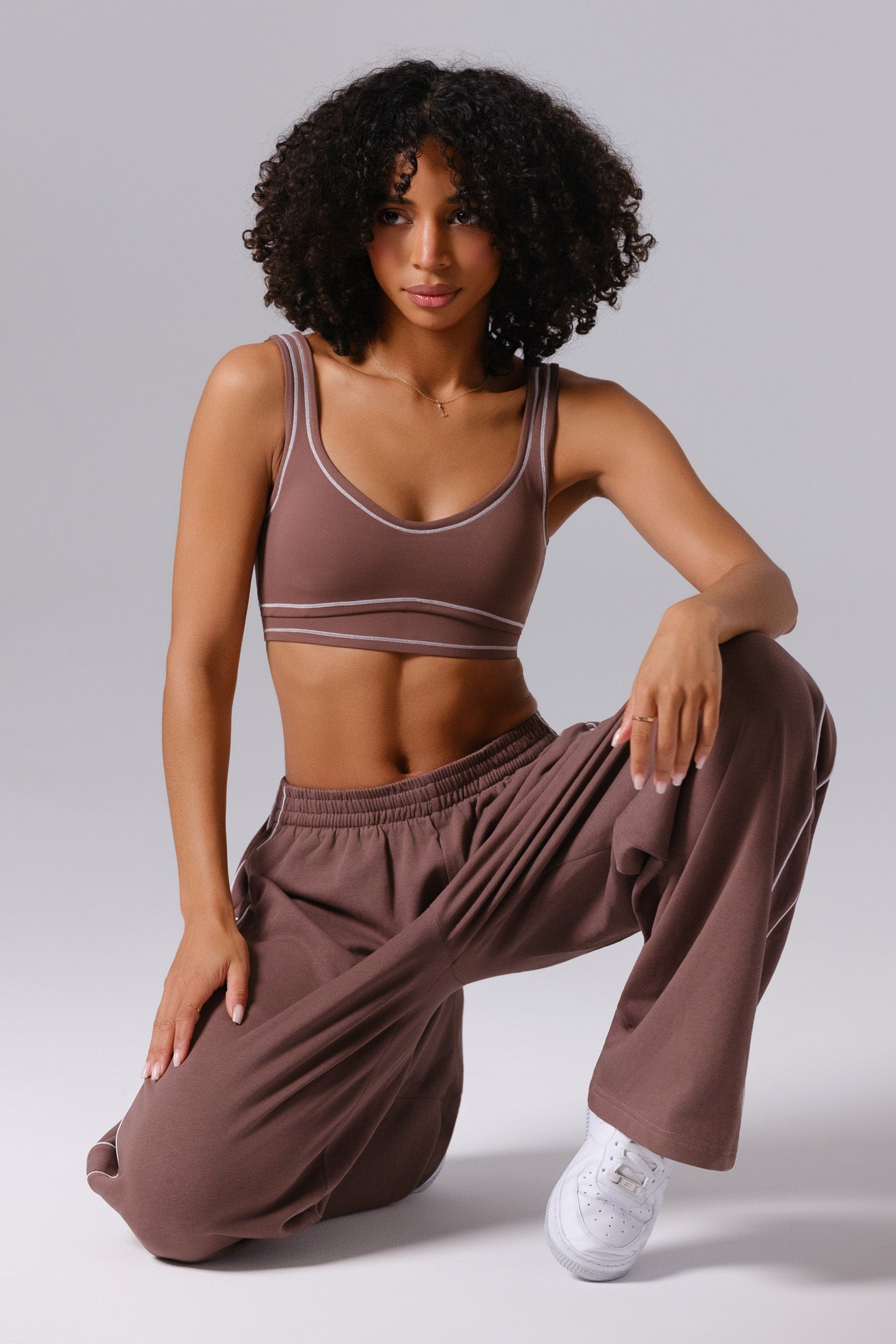 Soft chestnut Shelly sports bra from Maison and Aurora, featuring a sleek design and comfortable fit for active wear.