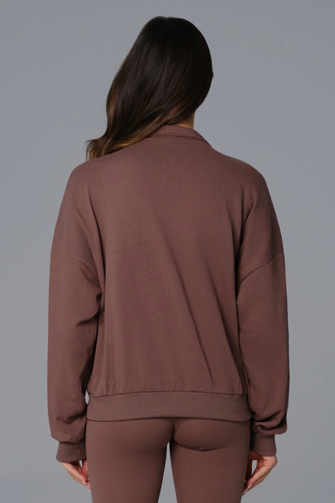 Maison and Aurora Essential Half Zip Sweatshirt in Umber, a cozy tops item with a half zip design and relaxed fit.