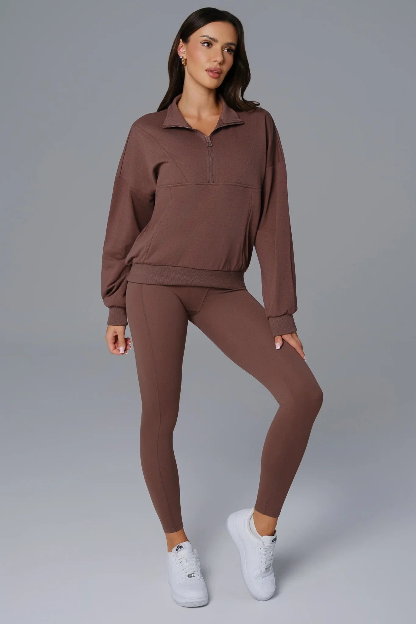 Maison and Aurora Essential Half Zip Sweatshirt in umber, showcasing the comfortable, casual top with a half-zip front and soft fabric.