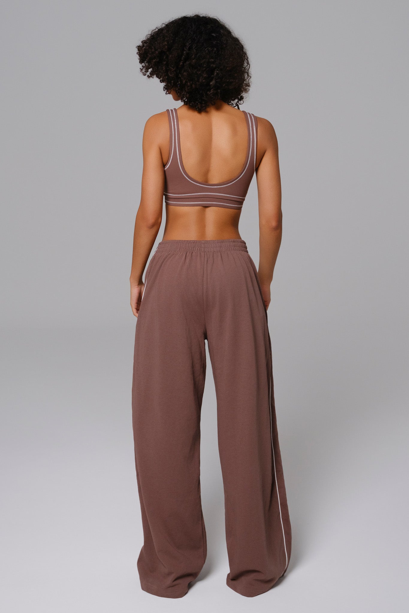 Maison and Aurora Shelly Sweatpants in soft chestnut, featuring a cozy fit and casual style, shown in a relaxed front view.