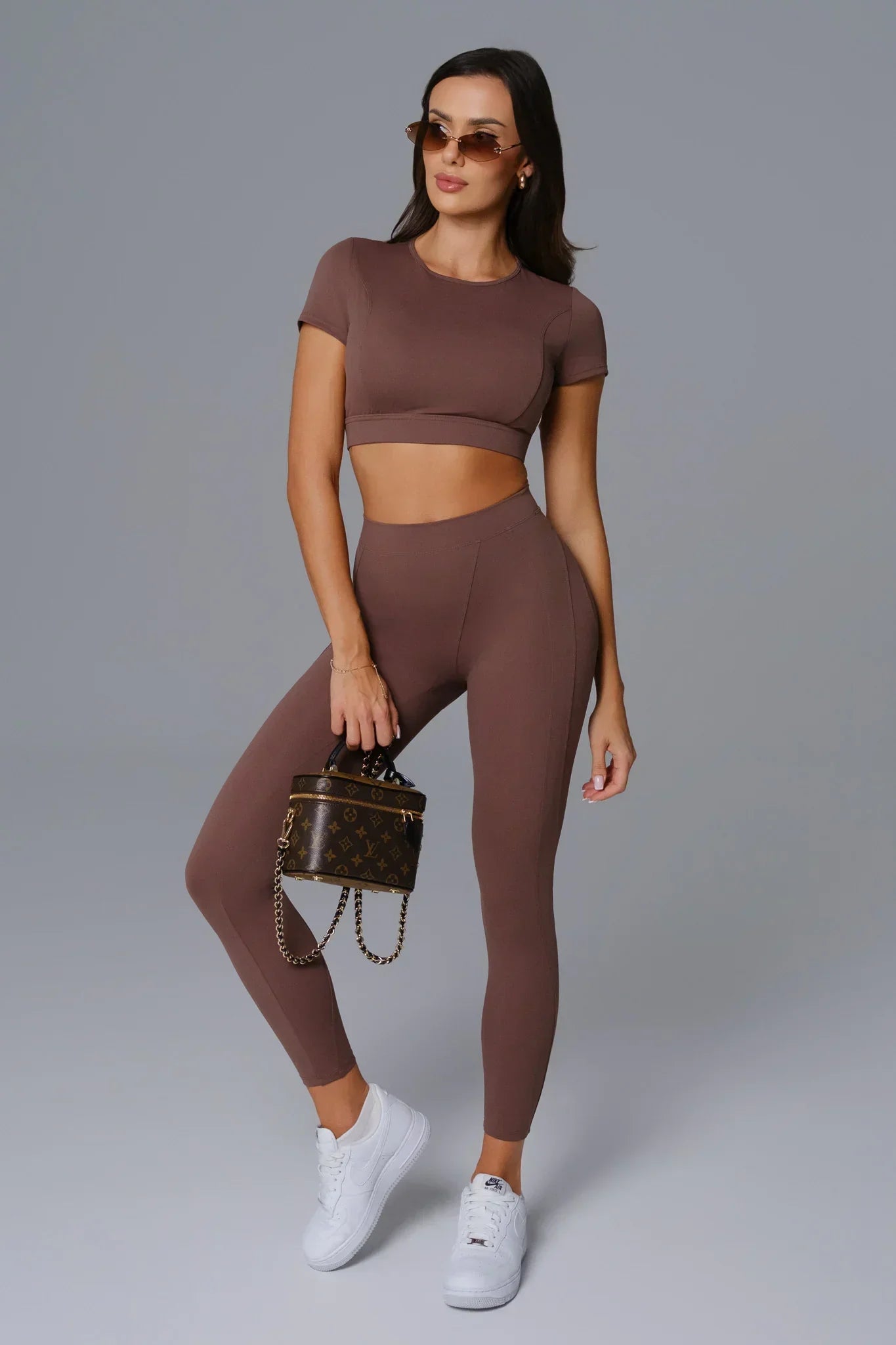 Maison and Aurora Essential High Waist Sculpting Leggings in Umber, showcasing the high waist and fitted design.