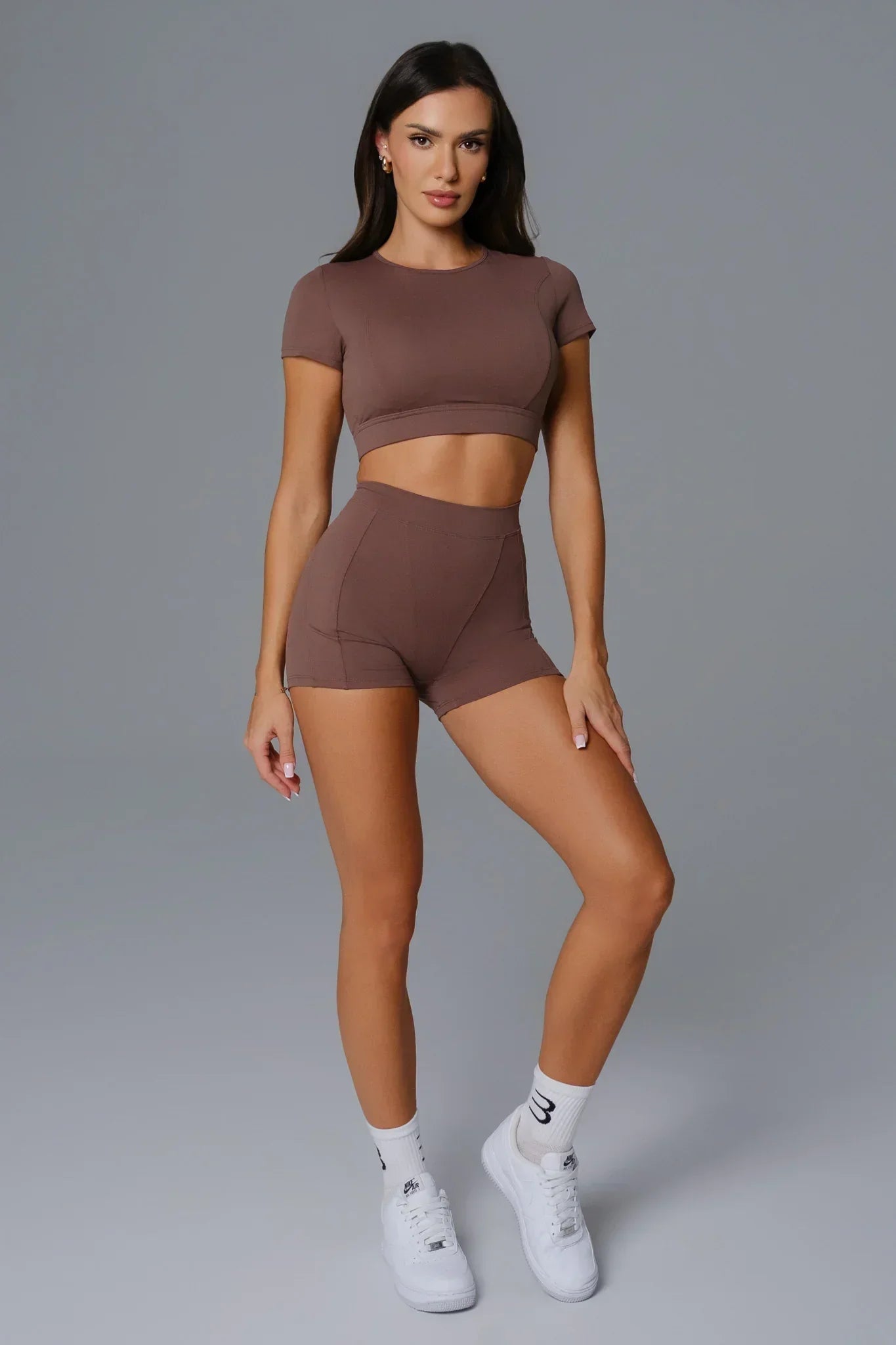 Maison and Aurora Essential High Waist Seamless Scrunch Shorts in Umber, showing the comfortable, form-fitting design and high waist fit.