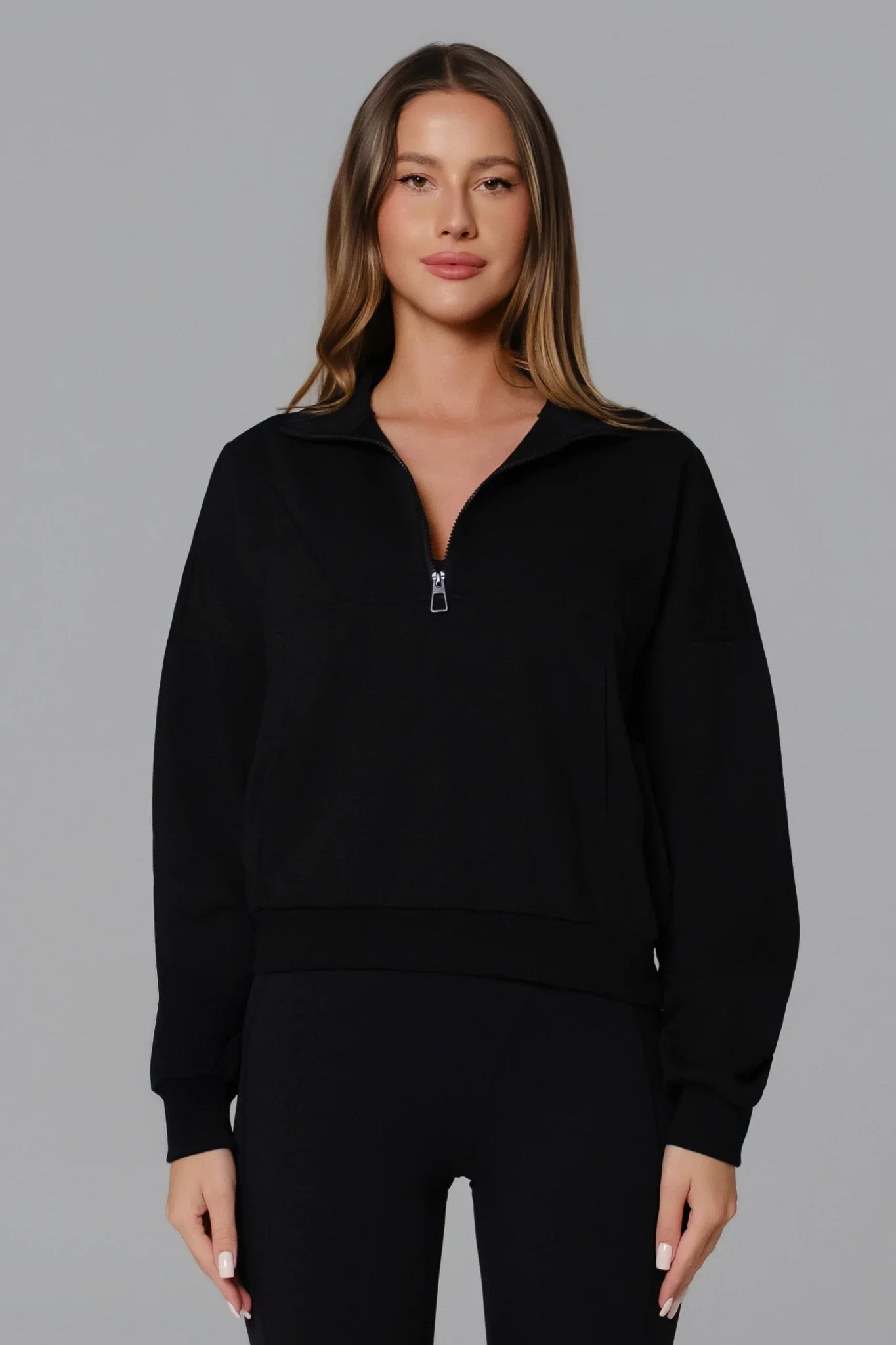 Maison and Aurora black Essential Half Zip Sweatshirt, a stylish casual top with a half zip collar and soft fabric.