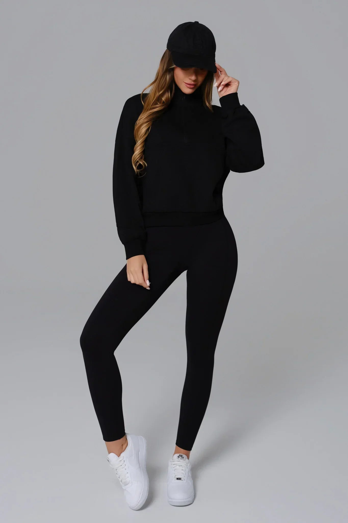 Black Maison and Aurora Essential Half Zip Sweatshirt, stylish black tops with a half-zip collar and comfortable fit.