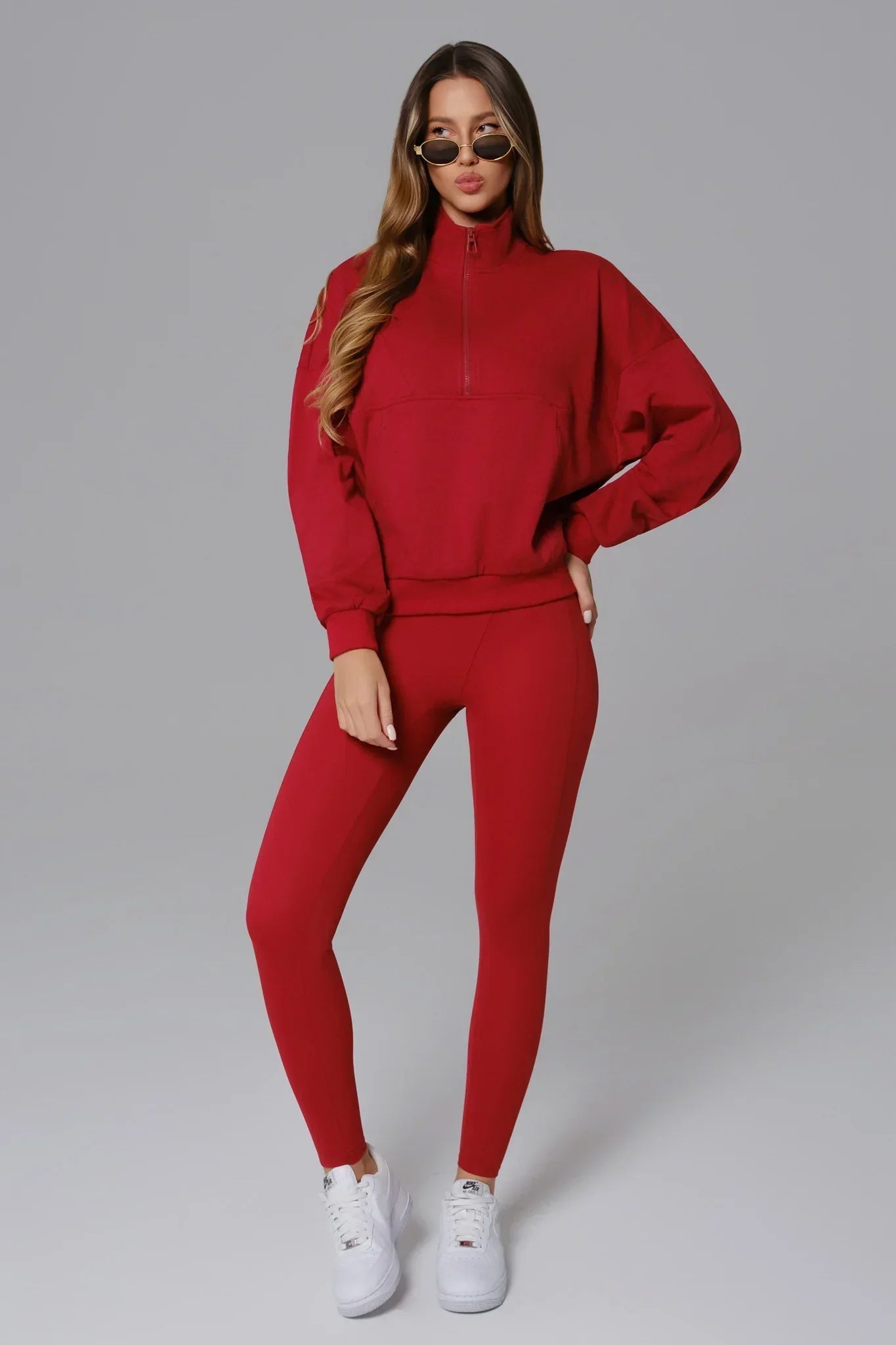 Maison and Aurora Ember Red half zip sweatshirt, casual athletic top with a high collar and comfortable fit.
