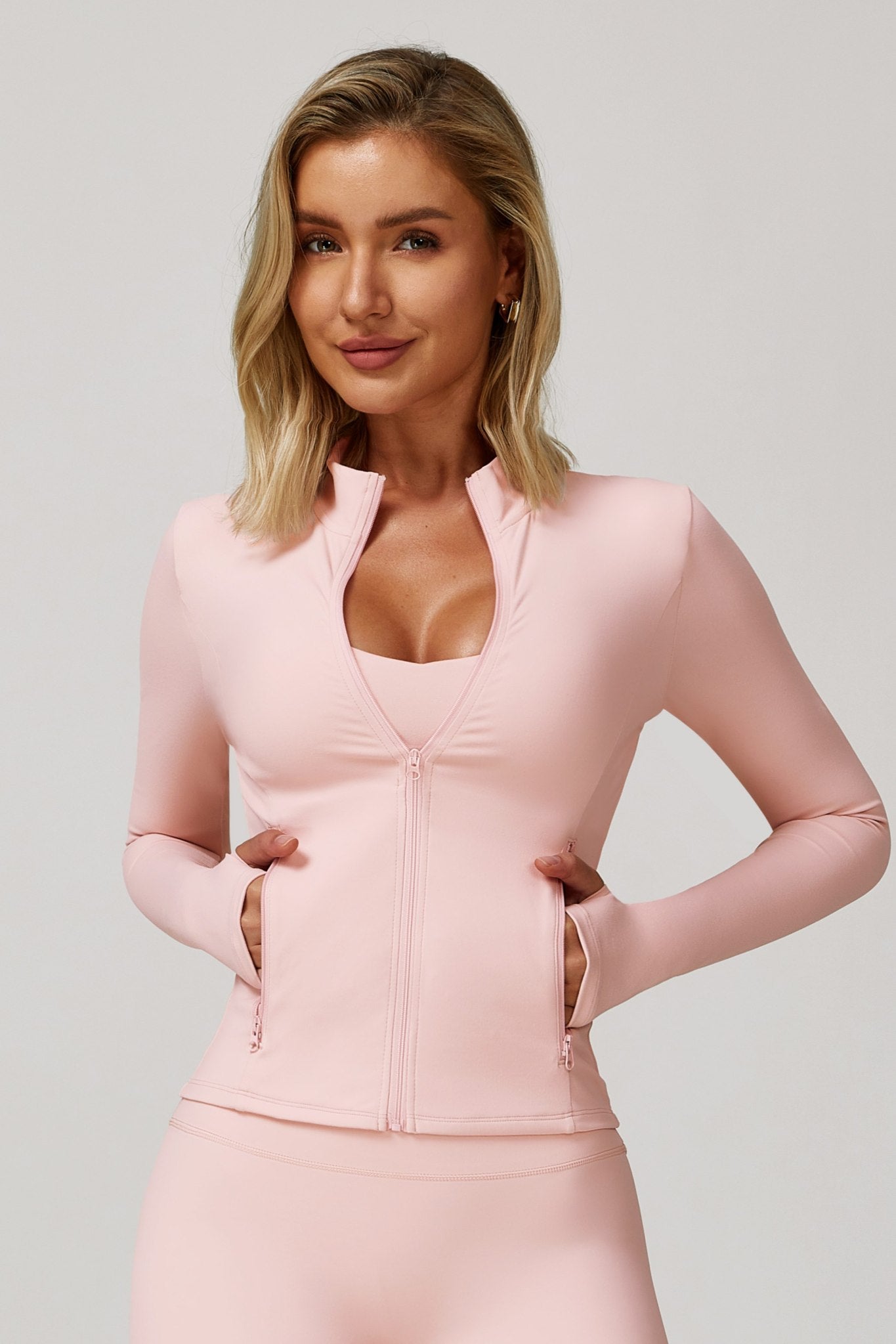 Peach Sahara Jacket by Maison and Aurora, showcasing a stylish and lightweight design perfect for casual wear.