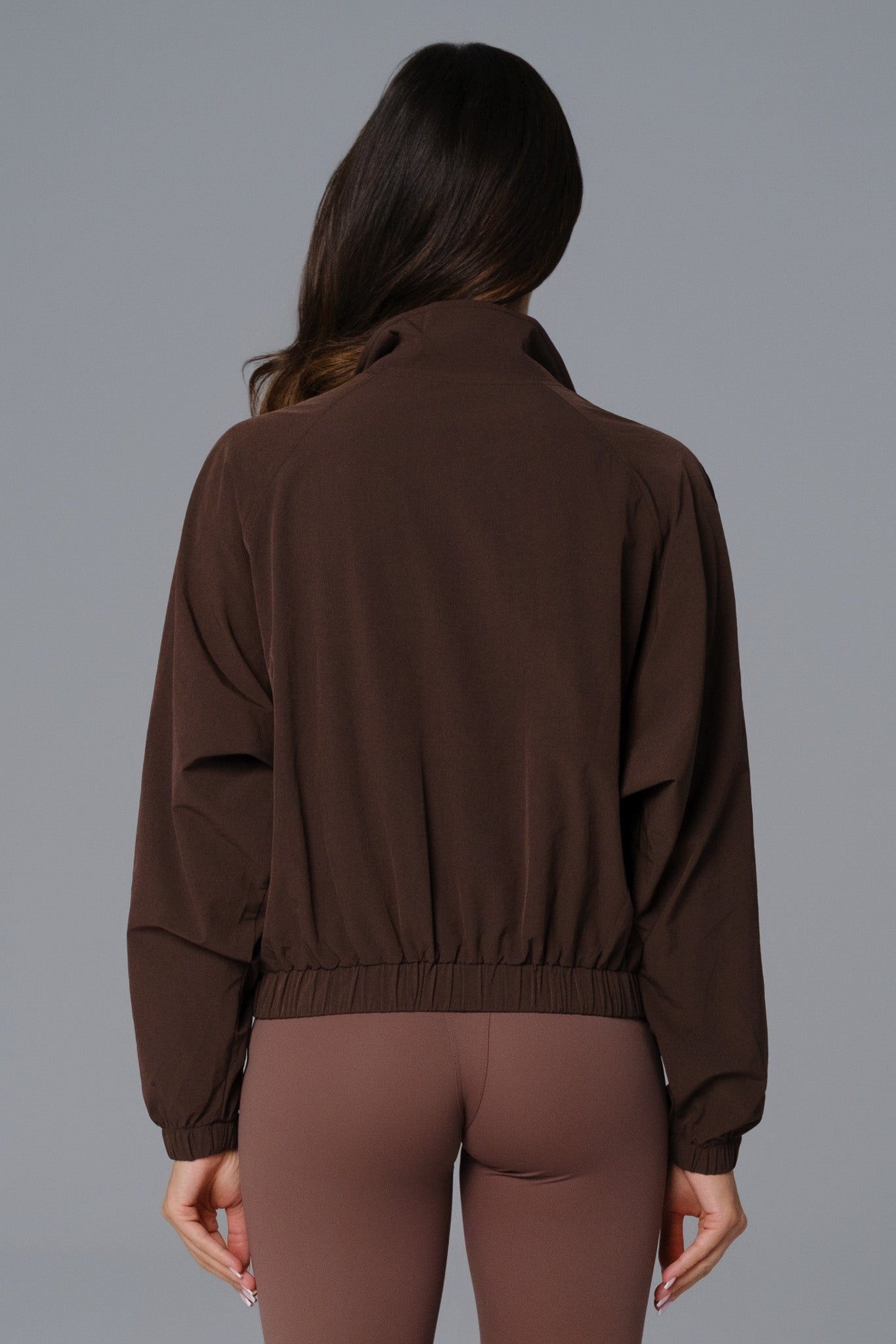 Maison and Aurora Ava cropped windbreaker jacket in russet brown, casual tops with a lightweight, stylish design.