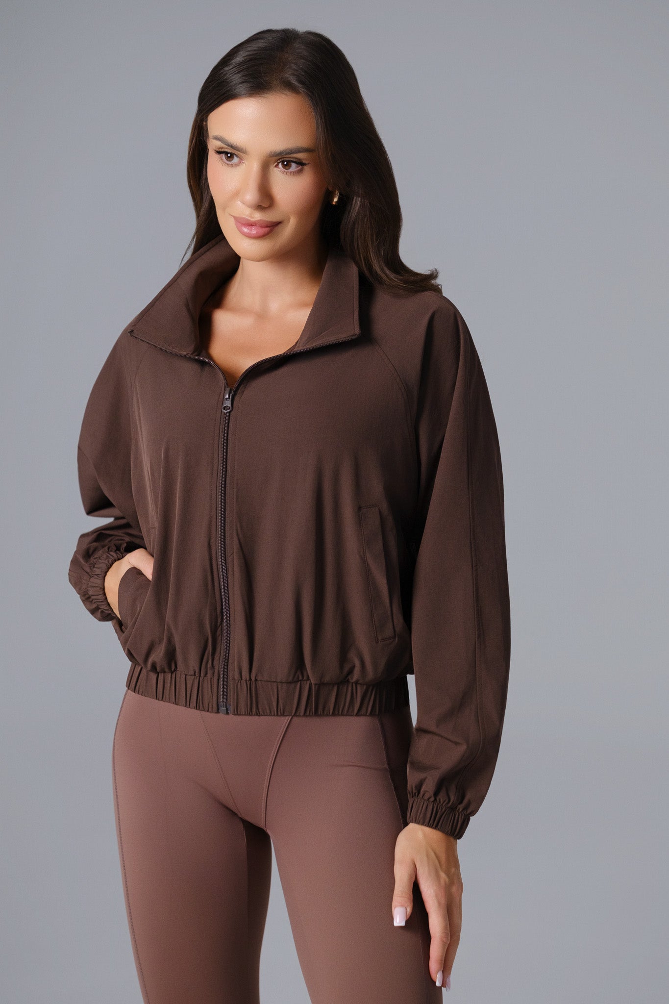 Maison and Aurora Ava cropped windbreaker jacket in russet brown, lightweight tops with a stylish, fitted design.